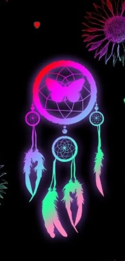 Colorful neon dreamcatcher with feathers and butterfly on black background.