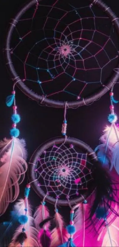 Vibrant dreamcatcher with neon feathers on a dark background.