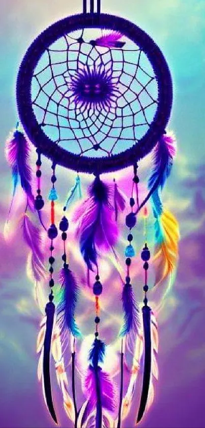 Vibrant dreamcatcher with purple feathers against a dreamy sky background.