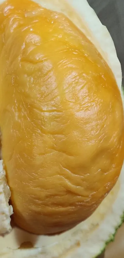 Close-up of vibrant durian fruit texture.