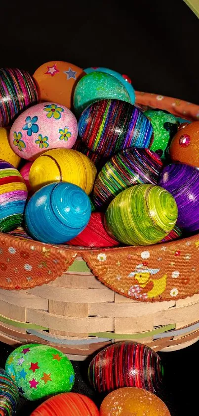 Colorful Easter eggs in a wicker basket on black background.