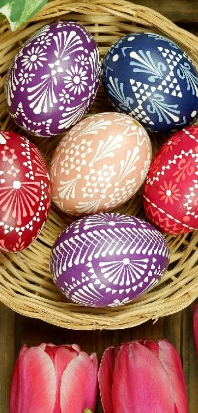 A basket of six colorful, intricately designed Easter eggs.