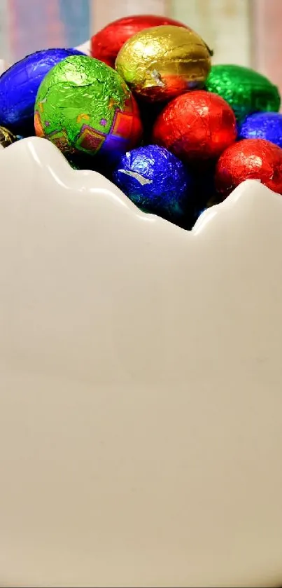 Colorful Easter eggs in a white shell bowl.