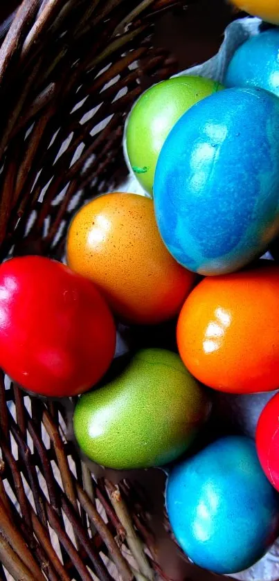 Colorful Easter eggs in a wicker basket creating a vibrant mobile wallpaper.