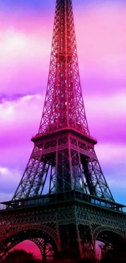 Vibrant pink and blue Eiffel Tower wallpaper with twilight sky.