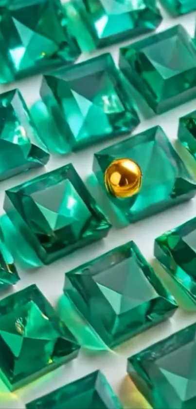 Emerald gemstones with a golden sphere amid geometric pattern.