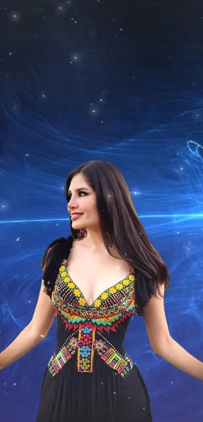 Woman in colorful ethnic dress against a cosmic blue background wallpaper.