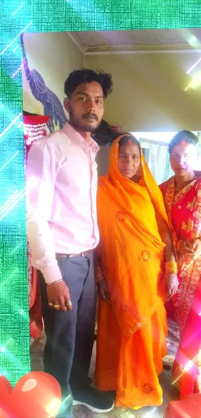 A family portrait with colorful traditional attire framed by a green and red border.