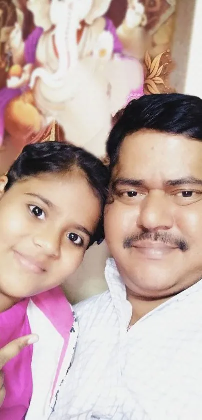 Father and daughter smiling in vibrant family portrait.