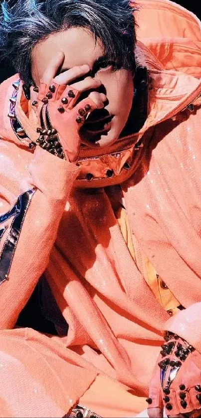 Vibrant fashion-forward portrait in peach hues.