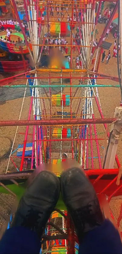 Colorful Ferris wheel view from above with boots.