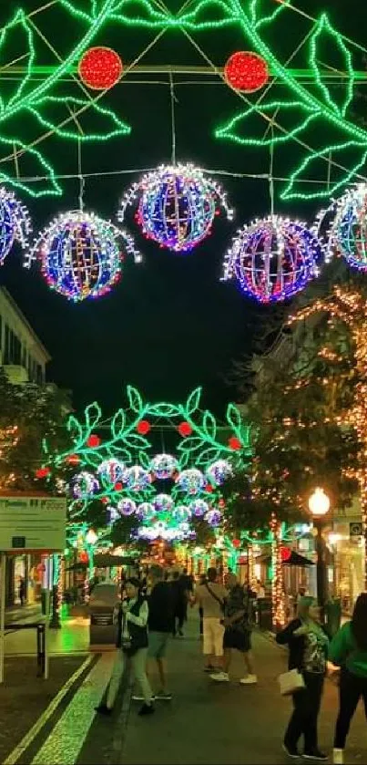 Colorful festive street with green arches.