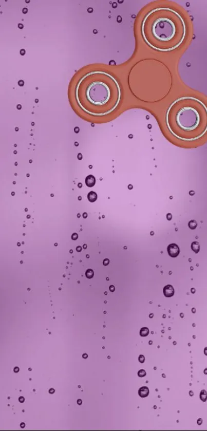 Purple wallpaper with fidget spinner and water droplets design.