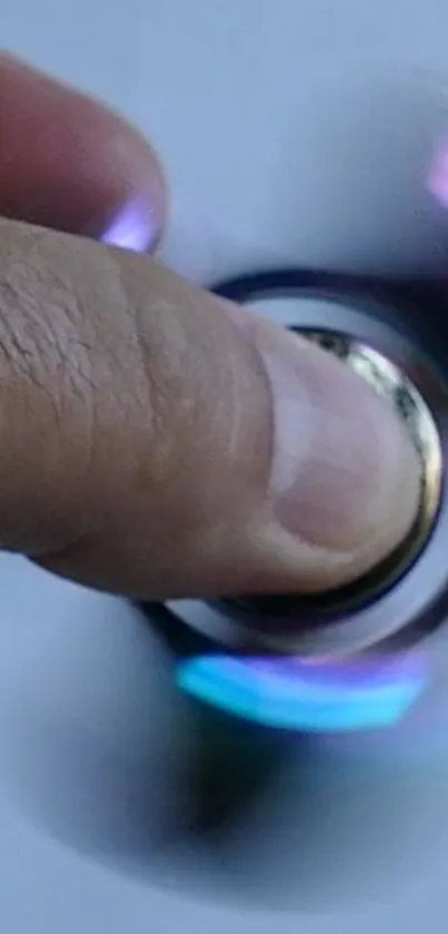 Close-up of a spinning fidget spinner with vibrant colors and motion blur.