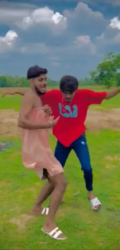 Two friends dancing in a vibrant green field.