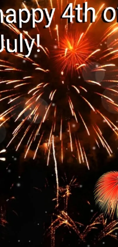 Vibrant fireworks celebrating 4th of July with bright orange and red bursts.