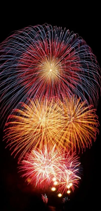 Colorful fireworks exploding in the night sky, creating a vibrant display.