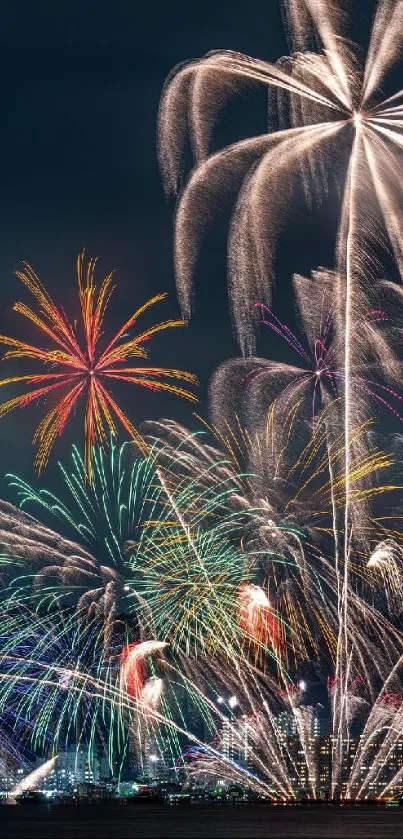 A vibrant display of fireworks over a city skyline at night.