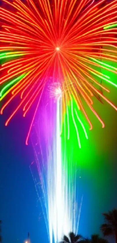 Vibrant fireworks burst over dark night sky with colorful trails.
