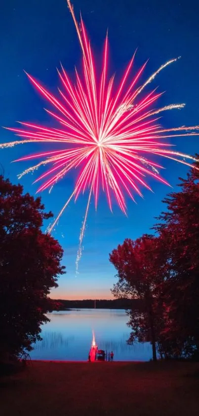 Red fireworks burst over a tranquil lakeside night.