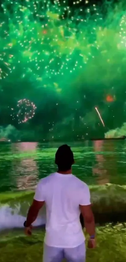 Fireworks exploding over ocean at night.