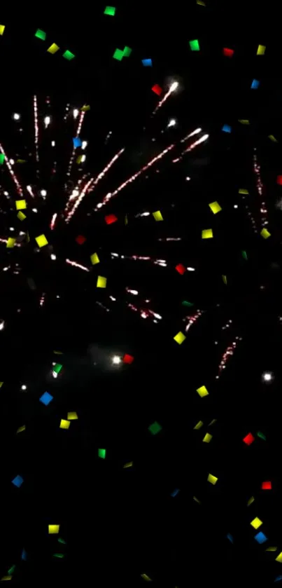 Vibrant fireworks with colorful confetti in the night sky wallpaper.