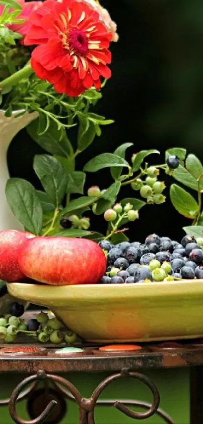 Colorful flowers and fruits in a vibrant arrangement.