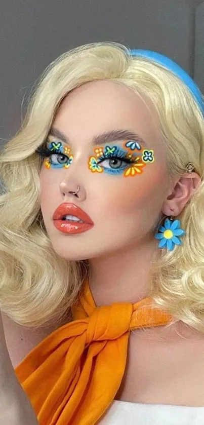 Woman with vibrant floral makeup and orange accents.