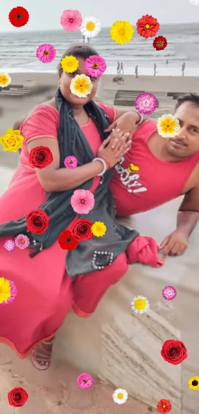 Couple in vibrant red with floral overlay at the beach.