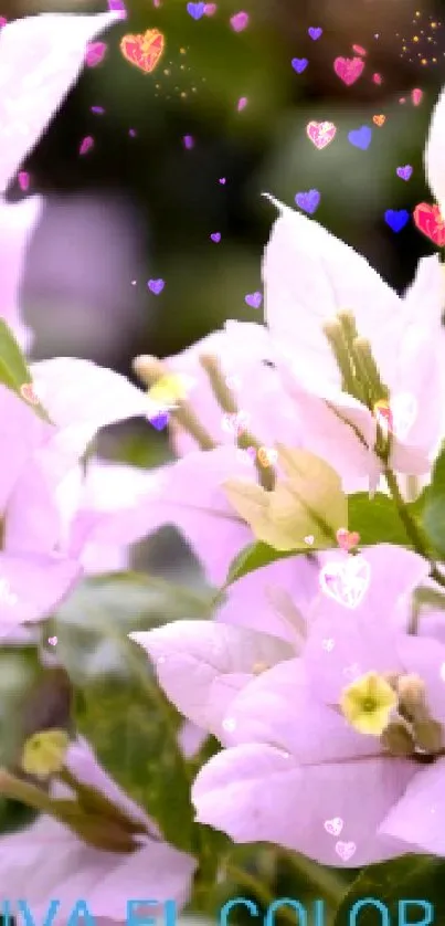 Delicate pink floral wallpaper with lush green leaves.