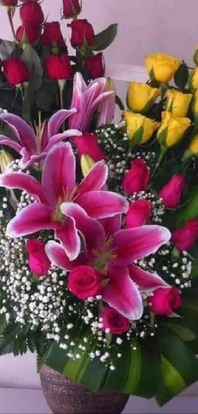 Floral bouquet wallpaper with red roses, yellow roses, and pink lilies.