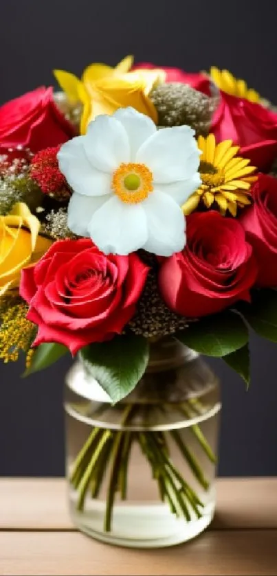 Vibrant bouquet of red, yellow, and white flowers in a glass vase.