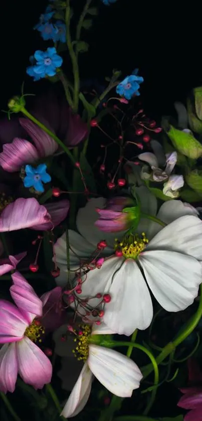 Vibrant floral bouquet with dark background, featuring pink, white, and blue flowers.