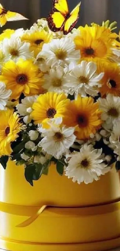 Yellow and white daisy arrangement with butterflies in a golden vase.