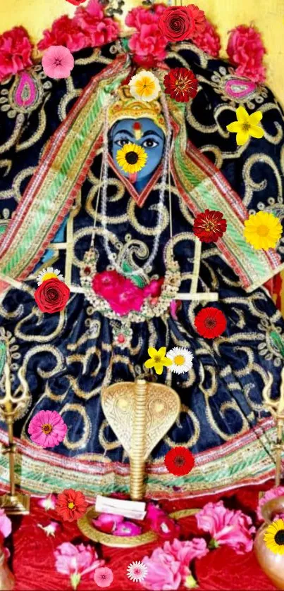 Colorful deity with floral decorations on intricate blue attire.