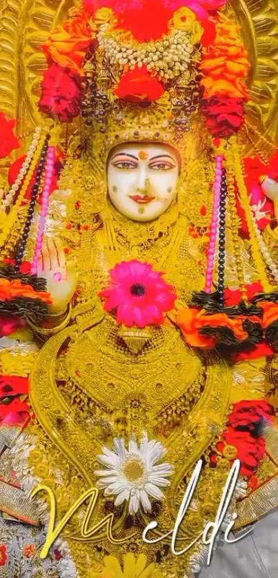 Vibrant deity adorned with gold and colorful flowers, enhancing spiritual ambiance.