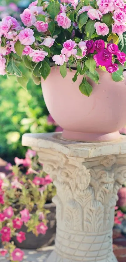 Elegant garden display with pink flowers on a decorative pedestal.