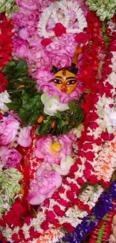 Floral garland surrounding vibrant idol.