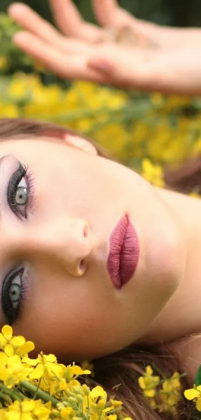 Person in green dress lying in yellow flowers.
