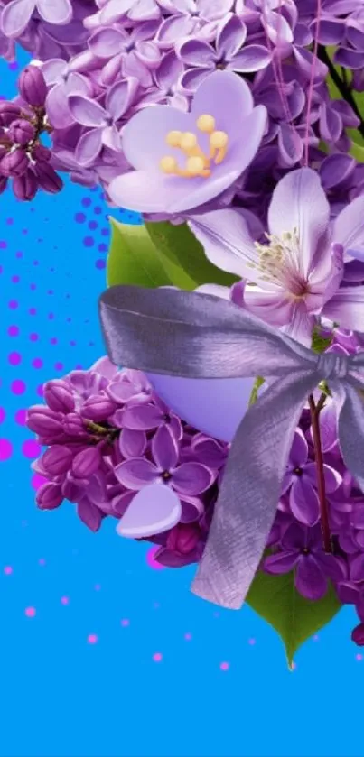 Purple lilacs and a ribbon on a blue background wallpaper.