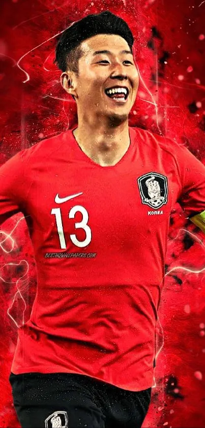 A football player celebrating in vibrant red tones, on a dynamic mobile wallpaper.