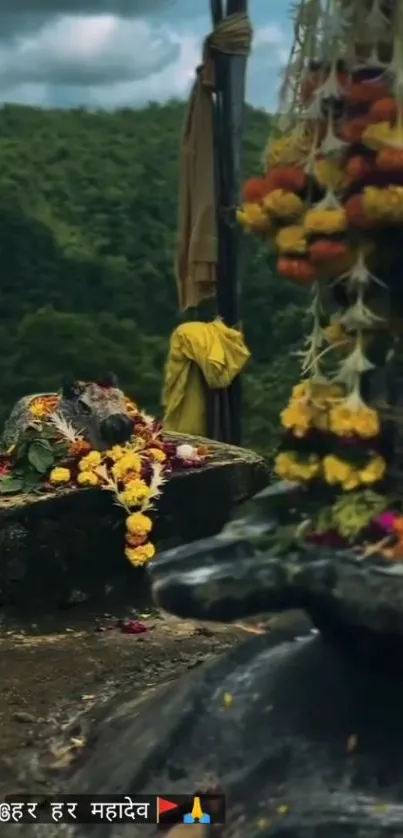 Colorful shrine in lush forest adorned with flowers.