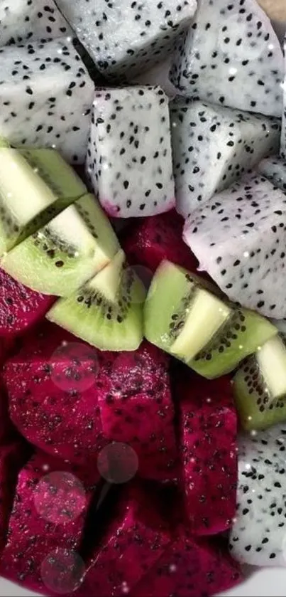 Fresh fruit bowl with dragon fruit and kiwi slices.