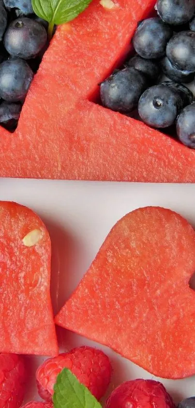 Heart-shaped watermelon with fresh berries.