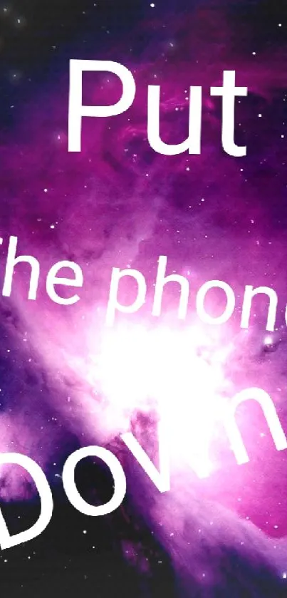 Purple galaxy wallpaper with motivational text 'Put the phone down'.