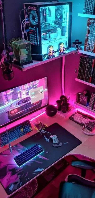 A vibrant gaming desk setup with pink and blue RGB lighting.