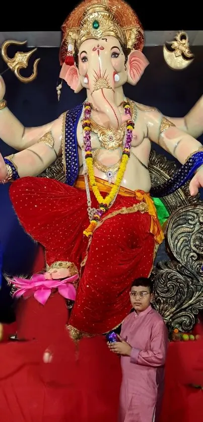 Large Ganesha idol during festival celebration.