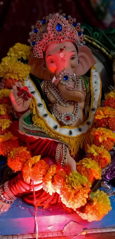 Colorful Ganesh festival decoration with marigold flowers.