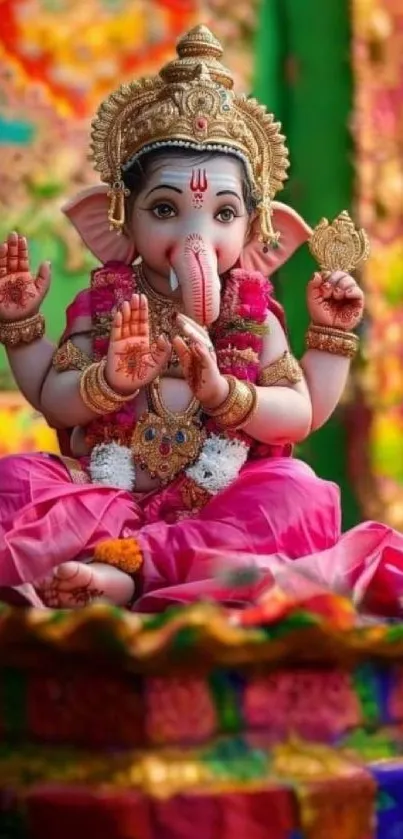 Vibrant Ganesha statue with colorful background.