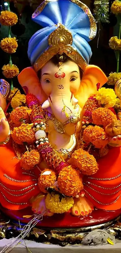 Vibrant Ganesha idol with floral garlands and traditional decor.